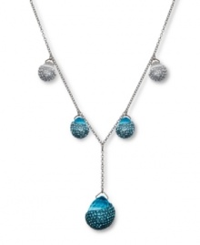 Dazzling and dramatic. Aquarmarine-hued crystals combine with clear crystal Pointiage® accents to enhance the beauty of Swarovski's Play Indicolite Y pendant necklace. Set in silver tone mixed metal. Approximate length: 15-7/10 inches. Approximate drop: 1-1/2 inches. Dazzling and dramatic. Aquarmarine-hued crystals combine with clear crystal Pointiage® accents to enhance the beauty of Swarovski's Play Indicolite Y pendant necklace. Set in silver tone mixed metal. Approximate length: 15-7/10 inches. Approximate drop: 1-1/2 inches.
