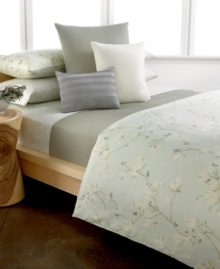 Elegance meets serenity with the floral design and muted tones of this Calvin Klein Oleander duvet cover set for a look of chic simplicity. Elegance meets serenity with the floral design and muted tones of this Calvin Klein Oleander duvet cover set for a look of chic simplicity.