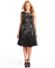 SL Fashions' plus size dress charms with a striped A-line silhouette that gives peeks of a floral print between its seams. SL Fashions' plus size dress charms with a striped A-line silhouette that gives peeks of a floral print between its seams.