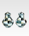 A charming pair that will always have a place at the table, handpainted in a checkerboard juxtaposition of ivory and onyx with bronzed stainless steel trim. Enameled steel Each, 3H X 2½ diam. Hand wash Imported 
