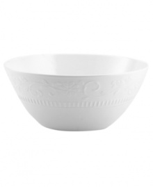 As durable as it is elegant, Mikasa's Countryside Scroll vegetable bowl features classically designed, chip-resistant bone china embossed with delicate scrolling vines and fluted detail. A pure white glaze makes it suitable for every day, any occasion. As durable as it is elegant, Mikasa's Countryside Scroll vegetable bowl features classically designed, chip-resistant bone china embossed with delicate scrolling vines and fluted detail. A pure white glaze makes it suitable for every day, any occasion.