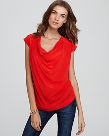 With a blazer and a pencil skirt or skinny cords and ankle boots, this Pippa silk top exudes easy elegance in the season's must-have red.