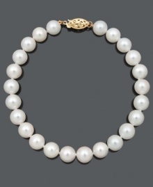 Excellence and luxury combine in this polished strand. Grade A+, cultured freshwater pearls (7-1/2-8 mm) shine against a 14k gold clasp. Approximate length: 8 inches. Excellence and luxury combine in this polished strand. Grade A+, cultured freshwater pearls (7-1/2-8 mm) shine against a 14k gold clasp. Approximate length: 8 inches.