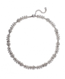 Spring is in full bloom every time you wear this elegant piece. Monet necklace features blossoms crafted from white glass pearls and sparkling crystal accents. Set in silver tone mixed metal. Approximate length: 16 inches + 2-inch extender.