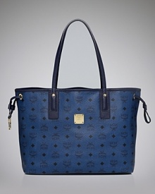 MCM pays homage to heritage style with this tote. A classic shape is day-right, while the bag's logo-printed exterior flaunts on-trend allure. MCM pays homage to heritage style with this tote. A classic shape is day-right, while the bag's logo-printed exterior flaunts on-trend allure.