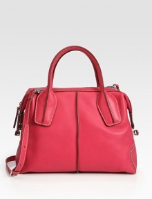 Vibrant leather in a roomy satchel, finished with dual straps for versatility.Double top handles, 4½ dropAdjustable detachable shoulder strap, 18-20 dropTop zip closureProtective metal feetOne inside zip pocketFully lined13W X 10½H X 6DMade in Italy Vibrant leather in a roomy satchel, finished with dual straps for versatility.Double top handles, 4½ dropAdjustable detachable shoulder strap, 18-20 dropTop zip closureProtective metal feetOne inside zip pocketFully lined13W X 10½H X 6DMade in Italy