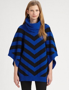 EXCLUSIVELY AT SAKS. Contrasting chevron pattern and an oversized funnelneck renew this wool-blend poncho sweater. Oversized ribbed funnelneckPoncho sleevesRibbed cuffs and hemAbout 27 from shoulder to hem40% cotton/40% nylon/20% woolDry cleanImportedModel shown is 5'9 (176cm) wearing US size X-Small/Small.