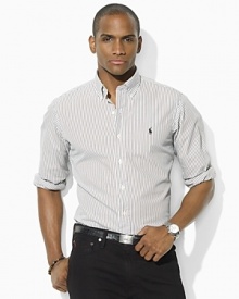Tailored in a modern trim-fitting silhouette, a handsomely striped sport shirt is rendered in washed oxford-woven cotton for the look and feel of a well-worn wardrobe favorite. Tailored in a modern trim-fitting silhouette, a handsomely striped sport shirt is rendered in washed oxford-woven cotton for the look and feel of a well-worn wardrobe favorite.