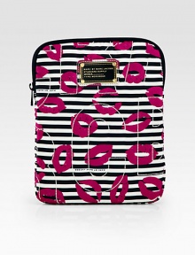 A bold and playful print on lightweight nylon with a topstitched logo motif, perfect for your favorite tech.Top zip closureFully lined7¾W X 10½H X 1DImportedPlease note: Tablet not included. A bold and playful print on lightweight nylon with a topstitched logo motif, perfect for your favorite tech.Top zip closureFully lined7¾W X 10½H X 1DImportedPlease note: Tablet not included.