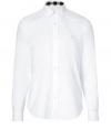 Casual and cool with its classic styling and super soft cotton, Burberry Brits white button-down is a timeless choice for all 4 seasons - Cutaway collar, long sleeves, buttoned cuffs, button-down front, tonal embroidered logo at chest, shirttail hemline - Classic straight silhouette - Wear with chinos and bright leather loafers