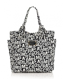 MARC BY MARC JACOBS' signature jumble-print logo lends this chic nylon tote a touch of whimsical flair. Oversized silhouette with double tied shoulder straps and concealed magnetic closure. Side exterior pockets. Interior zip, cell phone and additional pockets. Finished with a logo plaque at the front. Lined. MARC BY MARC JACOBS' signature jumble-print logo lends this chic nylon tote a touch of whimsical flair. Oversized silhouette with double tied shoulder straps and concealed magnetic closure. Side exterior pockets. Interior zip, cell phone and additional pockets. Finished with a logo plaque at the front. Lined.