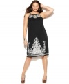 Flash a hint of skin with INC's halter plus size dress, accented by alluring keyholes.