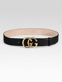 Textured leather with double G buckle and shiny antique brass hardware.About 1½ wide Leather Made in Italy Textured leather with double G buckle and shiny antique brass hardware.About 1½ wide Leather Made in Italy