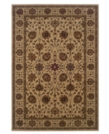 A lush, naturalistic motif teeming with beautifully detailed palmettes and meandering vines infuses your home with old-world sophistication. Woven from super soft polypropylene for superior stain resistance and durability, this magnificent area rug from Sphinx will maintain its lush texture and rich coloration for years to come. (Clearance)