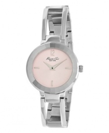Swooping lines and a ladylike pink dial define this darling watch from Kenneth Cole New York. Swooping lines and a ladylike pink dial define this darling watch from Kenneth Cole New York.
