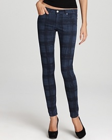 Paige Denim puts a preppy spin on their sleek skinny jeans with a punchy plaid print.