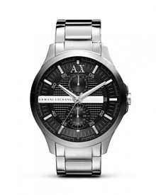 Sporty style gets extra sleek on this watch from Armani Exchange. Crafted of stainless steel, it flaunts a bold look with textured two eye chronograph and silvery accents.