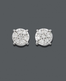 A simple accessory that makes a fabulous impact. Sparkling stud earrings are a must-have for every woman's jewelry collection. A 14k white gold prong setting shines with the addition of round-cut diamonds (1/5 ct. t.w.) in a circular pattern. Approximate diameter: 5-2/10 mm. A simple accessory that makes a fabulous impact. Sparkling stud earrings are a must-have for every woman's jewelry collection. A 14k white gold prong setting shines with the addition of round-cut diamonds (1/5 ct. t.w.) in a circular pattern. Approximate diameter: 5-2/10 mm.