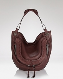 Perfect proportions cast in rich leather. Oryany's hobo is the accessory ideal for the on-the-go girl, with ample pockets and room to carry it all. Perfect proportions cast in rich leather. Oryany's hobo is the accessory ideal for the on-the-go girl, with ample pockets and room to carry it all.