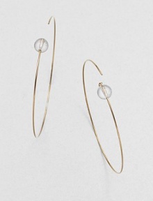 An exquisite bead of clear quartz on a 14k goldplated hoop. Clear quartz14k goldplated sterling silverLength, about 2Wire backMade in USA An exquisite bead of clear quartz on a 14k goldplated hoop. Clear quartz14k goldplated sterling silverLength, about 2Wire backMade in USA