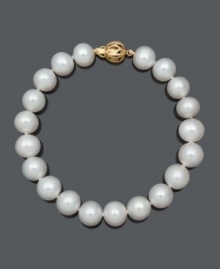 The perfect last-minute touch for a sophisticated look. This elegant bracelet features AA+ cultured freshwater pearls (9-10 mm) with an ornate 14k gold clasp. Approximate length: 8 inches.