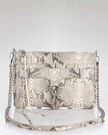 Introduce an exotic twist into your accessories portfolio with Rebecca Minkoff's crossbody bag. A day-to-night hero, this python-embossed beauty looses the strap and charms after dark. Introduce an exotic twist into your accessories portfolio with Rebecca Minkoff's crossbody bag. A day-to-night hero, this python-embossed beauty looses the strap and charms after dark.