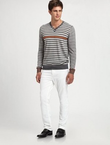 EXCLUSIVELY OURS. Multi-striped pullover sweater with three-button placket detail, handsomely woven in a rich merino wool blend.V-neckRibbed knit collar, cuffs and hem50% merino wool/50% acrylicMachine washImported EXCLUSIVELY OURS. Multi-striped pullover sweater with three-button placket detail, handsomely woven in a rich merino wool blend.V-neckRibbed knit collar, cuffs and hem50% merino wool/50% acrylicMachine washImported