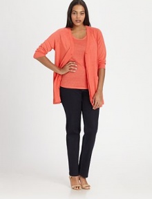 A beloved knit with classic ribbed trim and chic three-quarter sleeves. V-neckThree-quarter sleevesFront pocketsFront buttonRibbed trimAbout 33 from shoulder to hemLinenHand washImported of Italian fabric A beloved knit with classic ribbed trim and chic three-quarter sleeves. V-neckThree-quarter sleevesFront pocketsFront buttonRibbed trimAbout 33 from shoulder to hemLinenHand washImported of Italian fabric