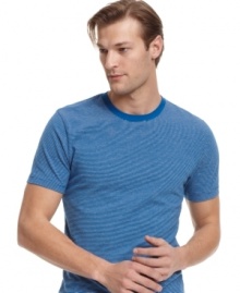 With a vintage heathered style and a slim fit, this Alfani RED tee is the true blend of classic and current. With a vintage heathered style and a slim fit, this Alfani RED tee is the true blend of classic and current.