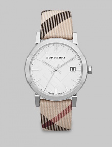 A true signature design with a check etched dial and a check strap. Quartz movementWater resistant to 5 ATMRound stainless steel case, 38mm (1.5) Smooth bezelSilver check stamped dialBar hour markersDate display at 3 o'clockSecond hand Nova check strapMade in Switzerland A true signature design with a check etched dial and a check strap. Quartz movementWater resistant to 5 ATMRound stainless steel case, 38mm (1.5) Smooth bezelSilver check stamped dialBar hour markersDate display at 3 o'clockSecond hand Nova check strapMade in Switzerland