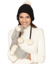 Snow angel-approved for keeping ears (and halos) toasty warm. This soft knit trapper hat from American Rag brings dangling fun. Snow angel-approved for keeping ears (and halos) toasty warm. This soft knit trapper hat from American Rag brings dangling fun.