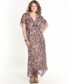 Take your boho look to the max with Fire's short sleeve plus size maxi dress, featuring a banded empire waist.