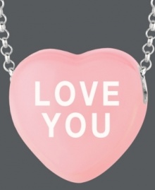 Everyone's favorite sentimental sweet. Sweethearts' adorable heart-shaped pendant expresses more that just great style with the words LOVE YOU written across a pastel pink enamel surface. Pendant crafted in sterling silver. Copyright © 2011 New England Confectionery Company. Approximate length: 16 inches + 2-inch extender. Approximate drop: 5/8 inch. Everyone's favorite sentimental sweet. Sweethearts' adorable heart-shaped pendant expresses more that just great style with the words LOVE YOU written across a pastel pink enamel surface. Pendant crafted in sterling silver. Copyright © 2011 New England Confectionery Company. Approximate length: 16 inches + 2-inch extender. Approximate drop: 5/8 inch.