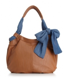 Grab hold of this sweet style by American Rag. An adorable contrast fabric bow is featured on side, while a roomy interior easily holds your day-to-day essentials. Grab hold of this sweet style by American Rag. An adorable contrast fabric bow is featured on side, while a roomy interior easily holds your day-to-day essentials.