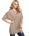 Jessica Simpson's striped tunic is the perfect partner to a pair of jeggings and peep-toe booties.