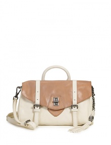 THE LOOKRectangular silhouetteRounded leather top handle & removable, adjustable crossbody strapTop flap closure with scored barrel turn-lockOutside buckled strap detailProtective metal feetTasseled chain with logo hardwareOne inside zip pocketTwo inside open pocketsLogo plaque on insideTHE FITTop handle, 3½ dropCrossbody strap THE LOOKRectangular silhouetteRounded leather top handle & removable, adjustable crossbody strapTop flap closure with scored barrel turn-lockOutside buckled strap detailProtective metal feetTasseled chain with logo hardwareOne inside zip pocketTwo inside open pocketsLogo plaque on insideTHE FITTop handle, 3½ dropCrossbody strap
