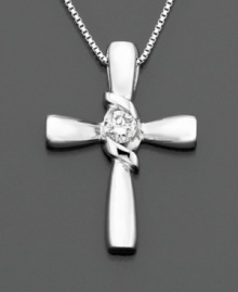 A single round-cut diamond (1/10 ct. t.w.) makes Sirena's cross pendant dazzle. Set in 14k white gold. Approximate length: 18 inches. Approximate drop: 1 inch. A single round-cut diamond (1/10 ct. t.w.) makes Sirena's cross pendant dazzle. Set in 14k white gold. Approximate length: 18 inches. Approximate drop: 1 inch.