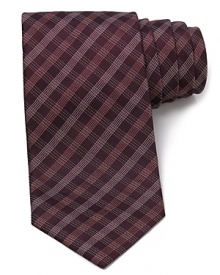 A vintage inspired piece from Armani Collezioni sparks your professional look with classic verve. A vintage inspired piece from Armani Collezioni sparks your professional look with classic verve.