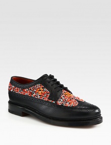 The basic brogue is revamped and revitalized in a colorful attempt to combine classic and modern aesthetics. This traditional style remains crafted in in neatly perforated leather and is accented with small beads for a bold, daring look.Leather upperLeather liningPadded insoleLeather soleImportedThis style runs true to size. We recommend ordering your usual size for a standard fit. The basic brogue is revamped and revitalized in a colorful attempt to combine classic and modern aesthetics. This traditional style remains crafted in in neatly perforated leather and is accented with small beads for a bold, daring look.Leather upperLeather liningPadded insoleLeather soleImportedThis style runs true to size. We recommend ordering your usual size for a standard fit.