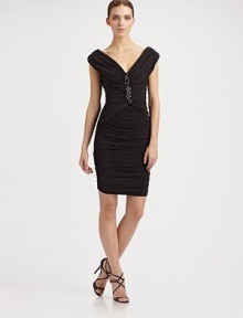 Gorgeously ruched and fitted into a curve-pleasing design embellished with center-front bead detail.V-neckline, front and back Concealed back zipper Fully lined About 21 from natural waist 93% polyester/7% spandex Dry clean ImportedOUR FIT MODEL RECOMMENDS ordering true size. Gorgeously ruched and fitted into a curve-pleasing design embellished with center-front bead detail.V-neckline, front and back Concealed back zipper Fully lined About 21 from natural waist 93% polyester/7% spandex Dry clean ImportedOUR FIT MODEL RECOMMENDS ordering true size.