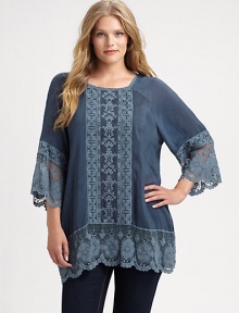 Lovely lace completes this embroidered tunic creating an exquisite design that you will not want to take off.Square neckLong sleevesLace cuffs and hemEmbroidered detailsPull-on styleAbout 32 from shoulder to hemRayonMachine washImported