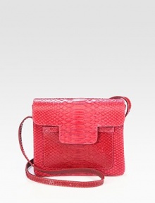 This petite style is constructed in luxurious python with a long crossbody strap.Shoulder strap, 22½ dropMagnetic flap closureOne outside open pocketOne open pocket under flapOne inside zip pocketSuede lining8¼W X 7H X 3DImported This petite style is constructed in luxurious python with a long crossbody strap.Shoulder strap, 22½ dropMagnetic flap closureOne outside open pocketOne open pocket under flapOne inside zip pocketSuede lining8¼W X 7H X 3DImported