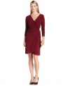 Calvin Klein's dress features sleek faux-wrap styling and a pretty tulip hem.