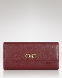 Salvatore Ferragamo's ever-chic wallet gets prettier in textured leather. Ten credit card pockets add practicality, while the brand's signature hardware is a luxurious touch.
