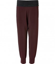 Easy and effortlessly chic, Neil Barretts harem pants are a contemporary cool separate perfect for dressing up and down - Pleated satin waistband, hidden side zip and snap closures, elasticized cuffs - Relaxed fit - Wear with chunky knits, carryall totes and heels