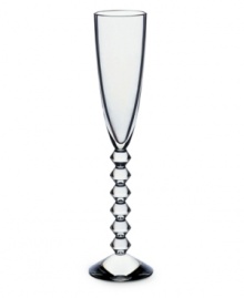 Baccarat redefines bold with the statuesque Vega flute. Premium crystal balancing a clear bowl and chunky, beaded stem exudes chic luxury in any setting.