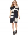 Looking stylish is a cinch with DKNYC's short sleeve plus size dress, featuring a geometric print and belted waist.