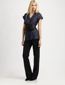 Crinkled fabrication meets a traditionally structured silhouette to create a look that is unquestionably feminine.Wrap-front designCuffed sleevesSide zipperSelf-tie beltBack waist dartsAbout 27 from shoulder to hem56% cotton/26% polyester/18% metallic threadDry cleanImported of Italian fabric Model shown is 5'10 (177cm) wearing US size 4. 