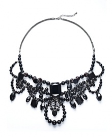 Dabble in the darker side of glamour. Bar III's dramatic statement necklace combines bold, black beaded details with a hematite tone mixed metal setting. Approximate length: 24 inches + 2-inch extender. Approximate drop: 8 inches.