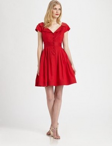 Flirty retro-chic in a full-skirted frock styled with a nipped waist and skin-baring back cutout.V necklineModified notch collarCap sleevesBust dartsButton-down frontPleated skirtBack V with button closureAbout 21 from natural waist98% cotton/2% spandexDry cleanMade in USA of imported fabricModel shown is 5'10 (177cm) wearing US size 4. Flirty retro-chic in a full-skirted frock styled with a nipped waist and skin-baring back cutout.V necklineModified notch collarCap sleevesBust dartsButton-down frontPleated skirtBack V with button closureAbout 21 from natural waist98% cotton/2% spandexDry cleanMade in USA of imported fabricModel shown is 5'10 (177cm) wearing US size 4.